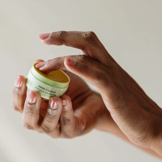 Erleia Under Eye Balm being used by a Black person