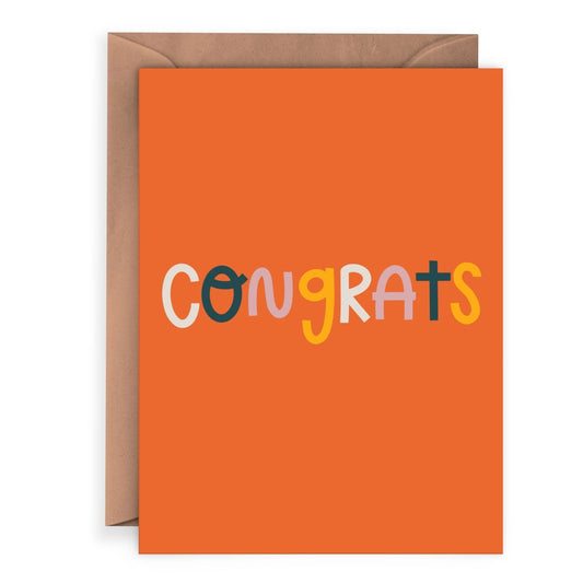 Orange greeting card with 'Congrats' in colorful letters and a brown envelope.