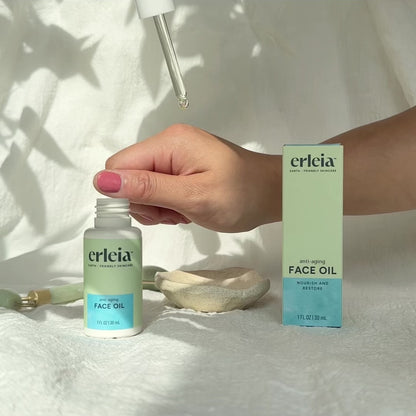 Short video clip, no audio, of the Erleia Face Oil - Anti-Aging being swatched on an East Asian hand. It is a translucent light yellow oil that is quickly absorbed on the hand.